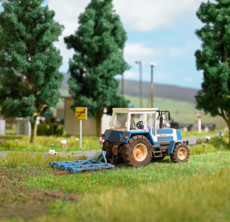 %_tempFileName50418%20Traktor%20mit%20Schwergrubber%20Stimmung%